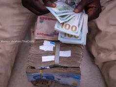 Naira gains at official market, trades at N1,421/$