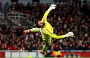 Arsenal in ‘survival’ mode as ‘sensational’ Raya save keeps them top
