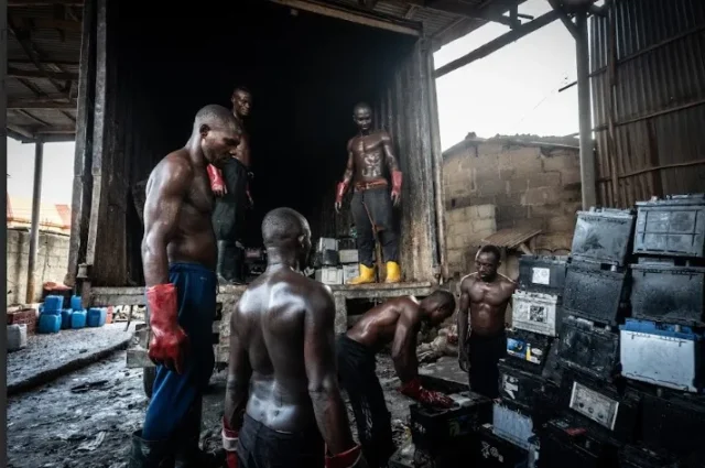 Labourers-load-old-vehicle-batteries-onto-a-truck-that-will-deliver-them-to-battery-recycling-facilities-which-melt-the-lead-inside-for-new-batteries