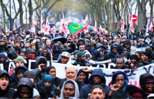 Thousands Protest In Paris Over Death Of Migrant Worker