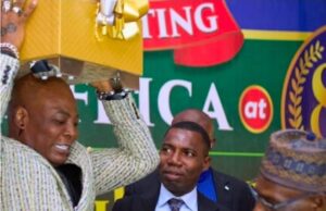 Charly Boy Carries Huge Box on His Head to Gift Obasanjo at His 89th Birthday Party